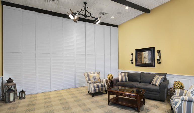 Shutters as a room divider for a showroom